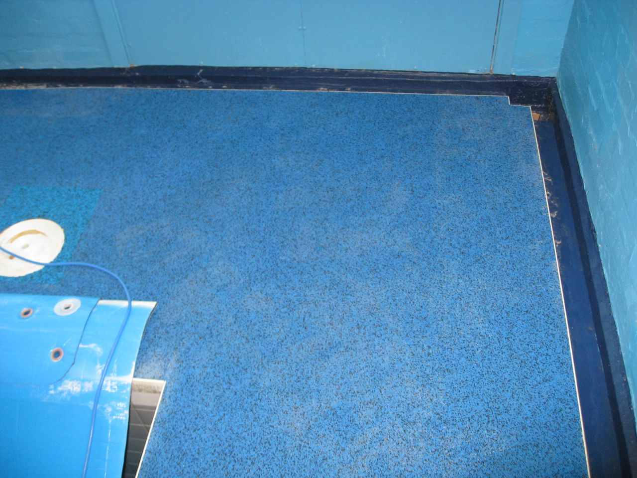Cleaning Limescale Off Rubber Floor By Swimming Pool
